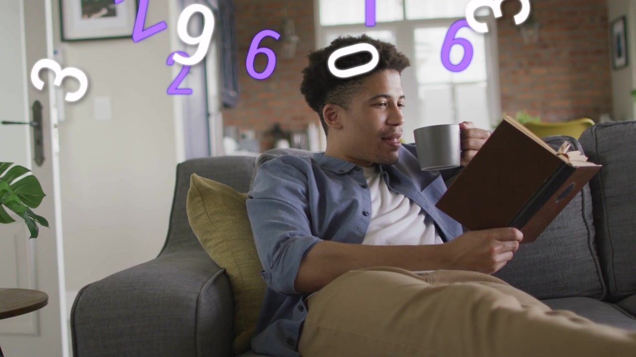 Man reclining sofa reading book animated numbers appearing left swirling over him showing tech data