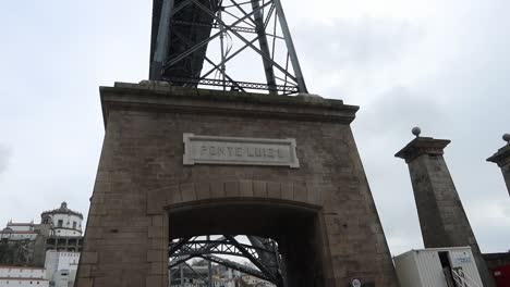 dom luis i bridge or ponte luiz i sign against grey sky, porto