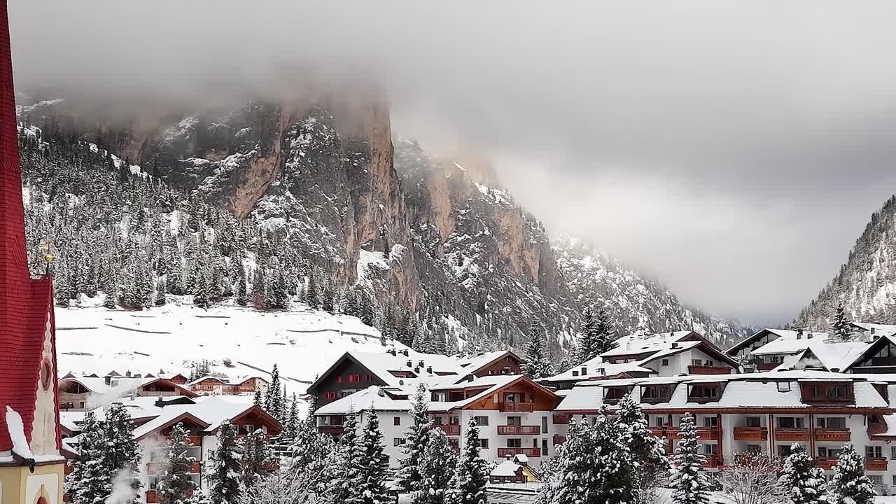 Snowy alpine village in the Italian Alps during winter season
