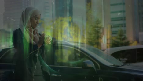 animation of neon round scanner against woman in hijab using smartwatch on the street