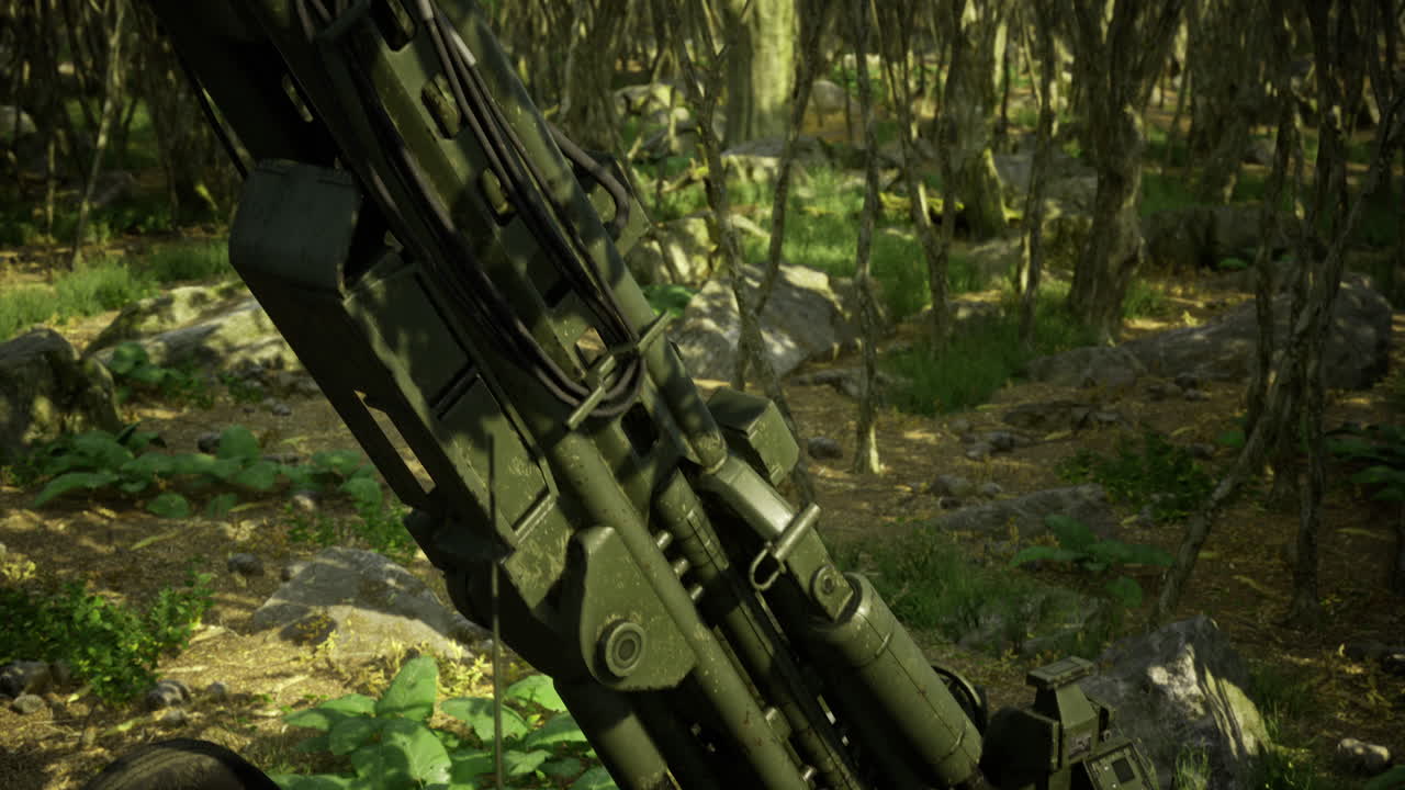 Weapon system camouflaged in dense forest setting during daytime