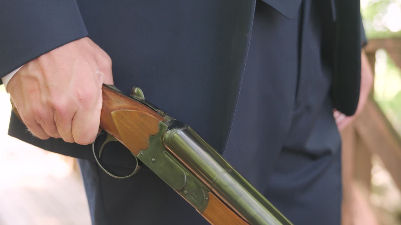 groom loading up shot gun