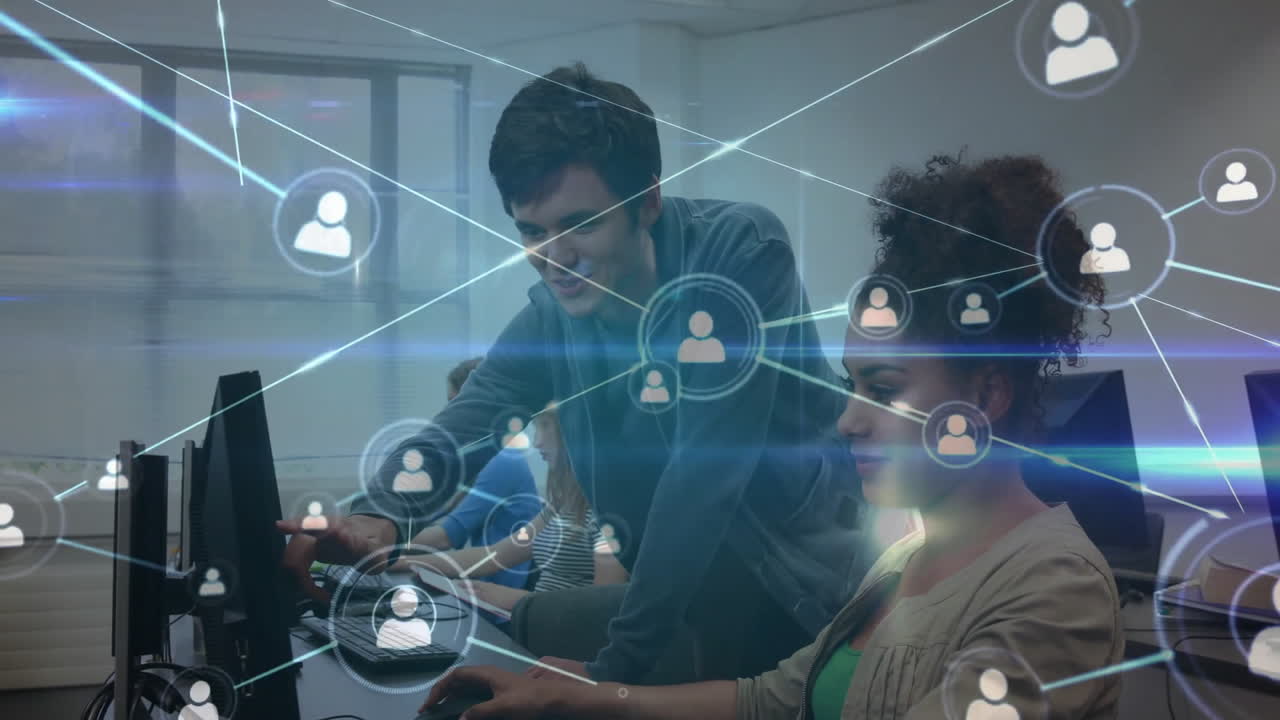 Network connections animation over diverse people working on computers in office