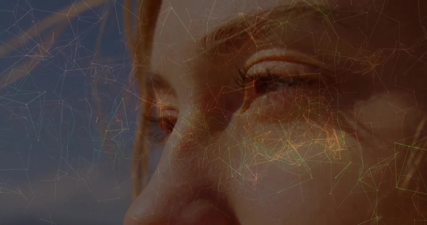 Breeze initiating hair drifting across woman, digital network overlay shifting revealing technology