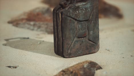 old rusty fuel canister in the desert