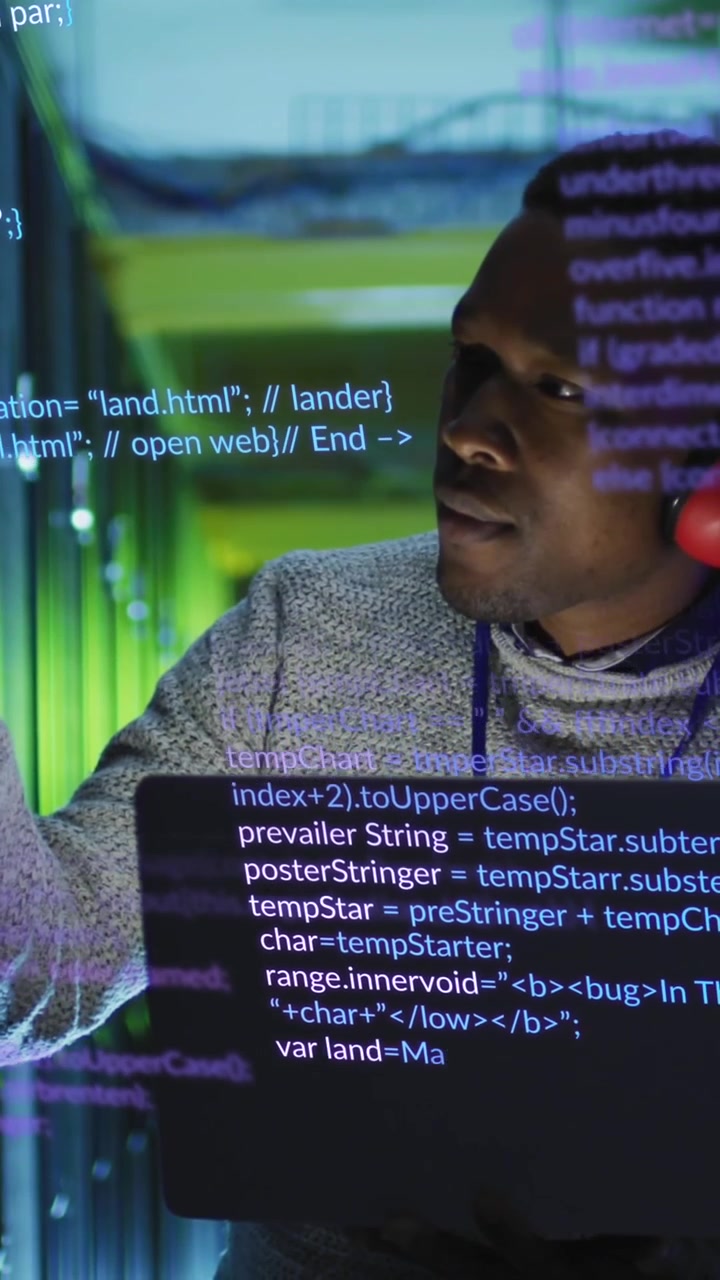 Animation of data processing over african american male engineer with laptop working at server room