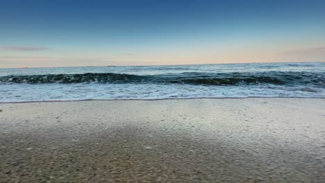 blue-waves-at-sunset-sky