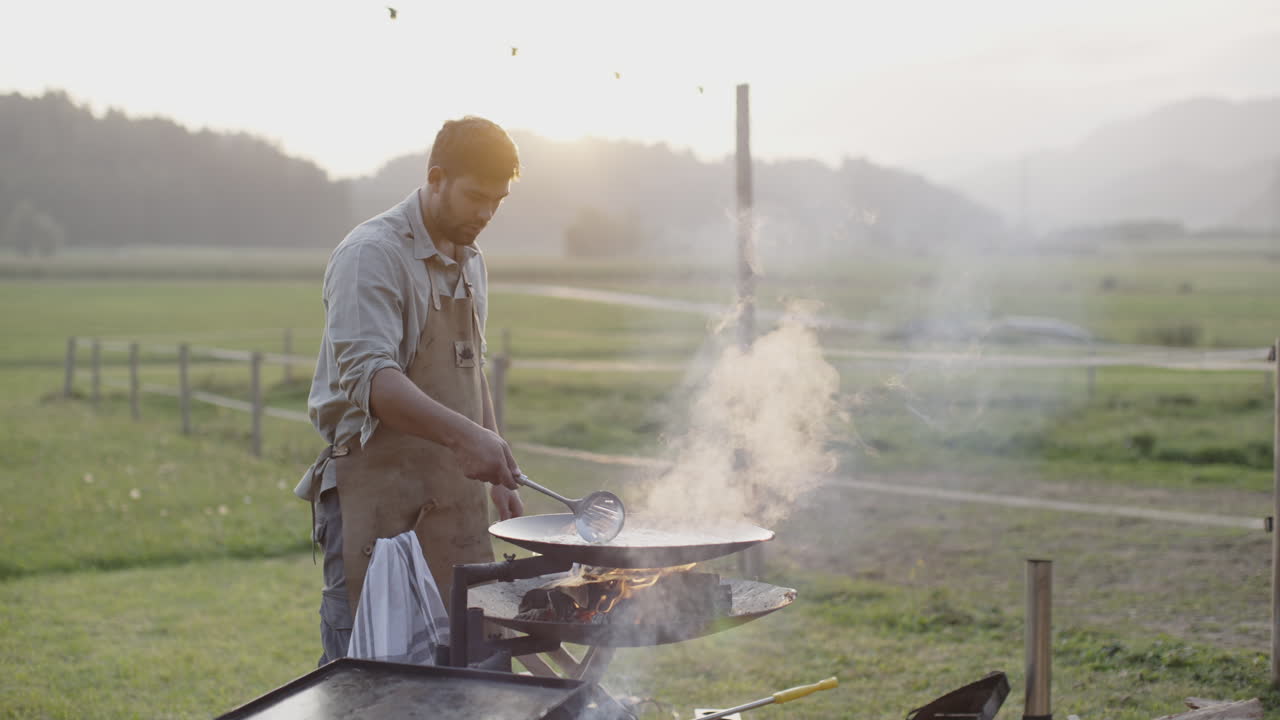 Man Grilling Outdoors