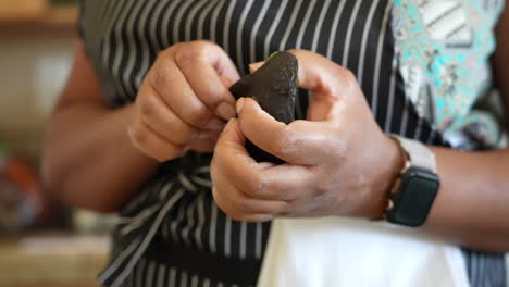 pealing an avocado to add to a chopped salad - antipasto salad series