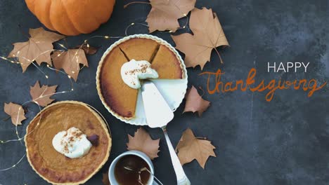 4k seamless loop of pumpkin pie flat lay and lights twinkling. happy thanksgiving text fading in..