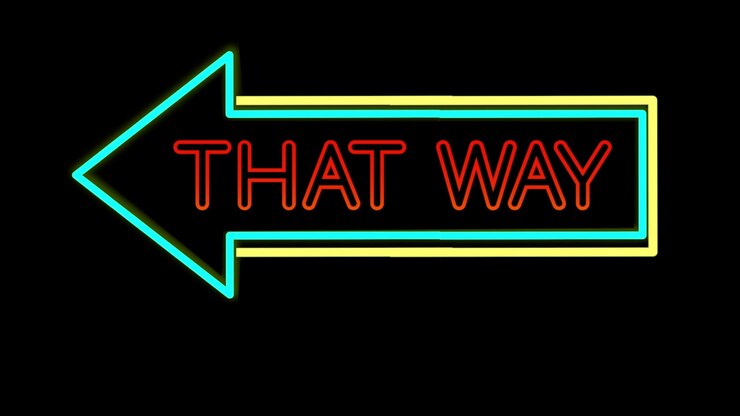 Graphical, flickering neon sign of arrow facing left with title 'THAT WAY!'