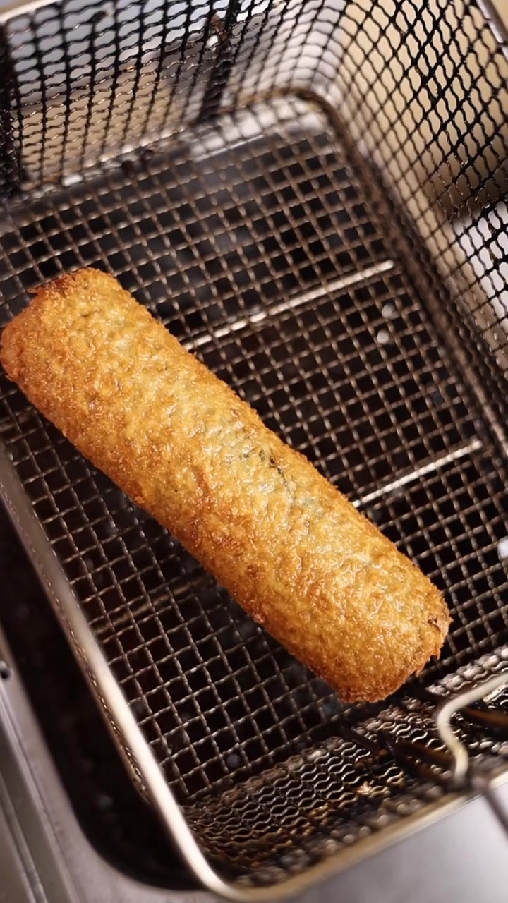 Close-up of a Snack Being Deep Fried to Golden Perfection