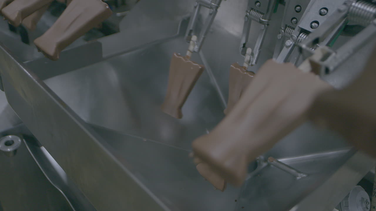 Equipment for the food industry, automatic line for coating products with chocolate