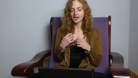 woman wave hands, talks with gestures, use laptop for online meeting, video call