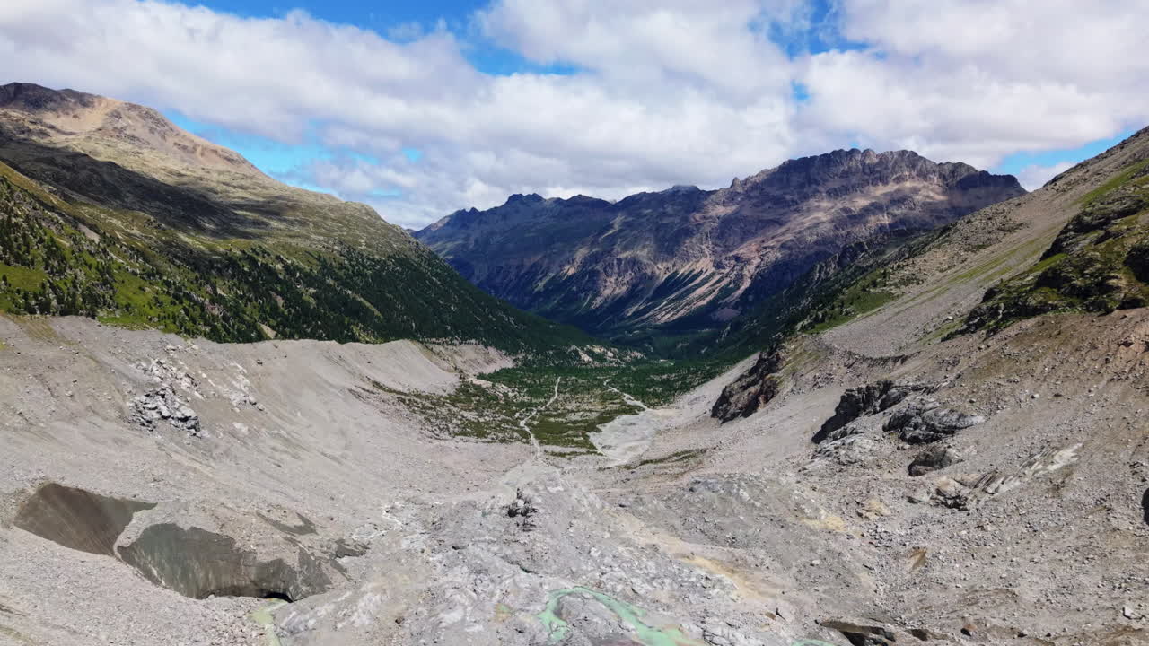 Majestic mountain valley landscape in Morteratsch, Switzerland, clear sky