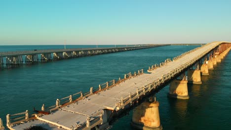 Post-apocalyptic-look-and-feel-through-aerial-of-old-over-the-water-road-in-the-Key-islands