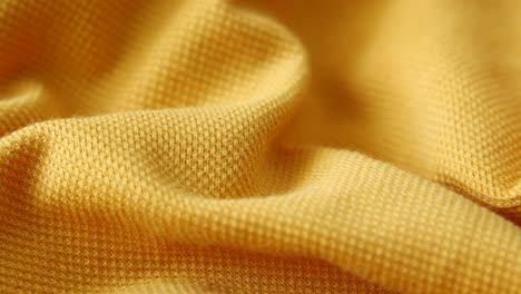 close up of a yellow fabric texture