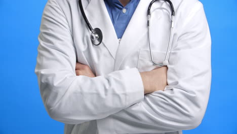 Studio-Shot-Of-Male-Doctor-Wearing-White-Coat