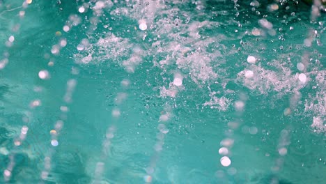 abstract water background with falling drops close up