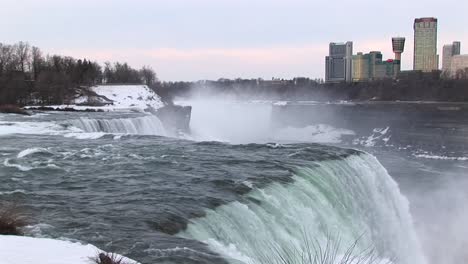 the mist rises from the bottom of niagara falls