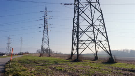 twin poles towering rural lands of france at daytime