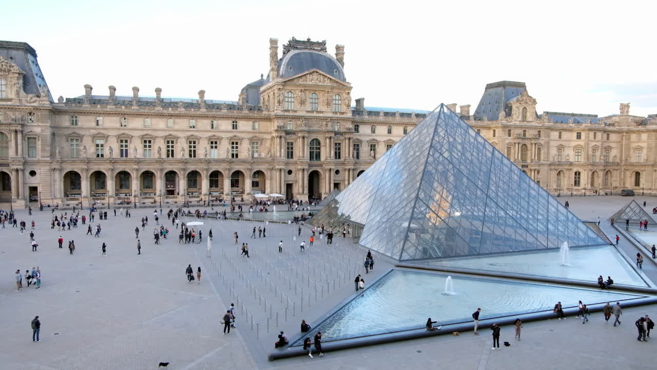 Paris, France - November 21, 2021: Front view of the Louvre Museum in daylight