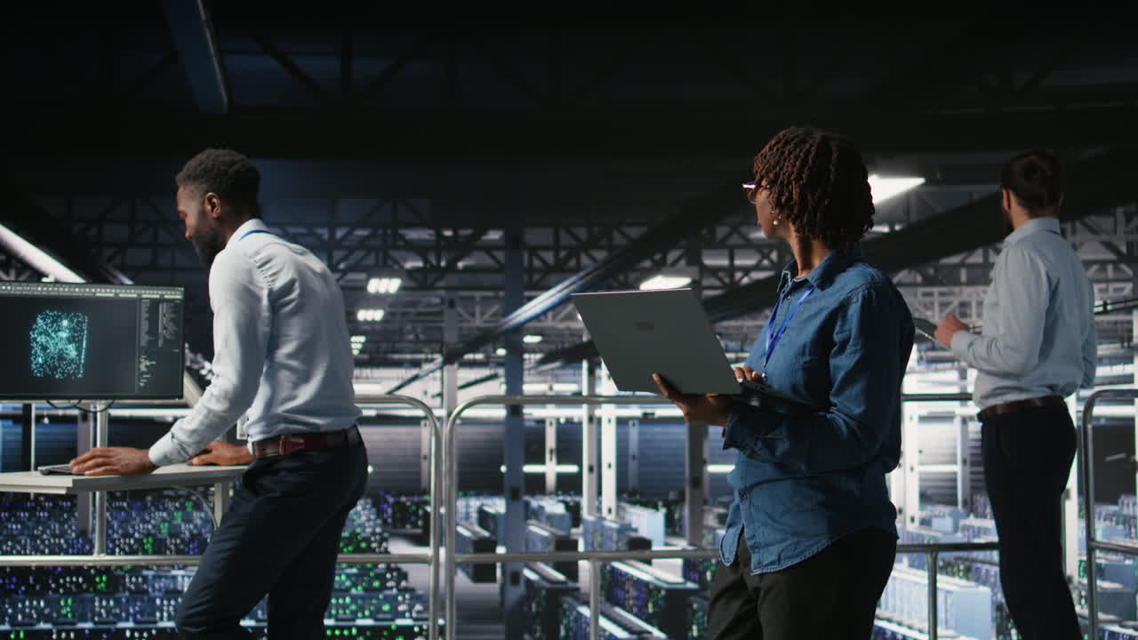 Data center software developers using devices to review AI LLM visualizations