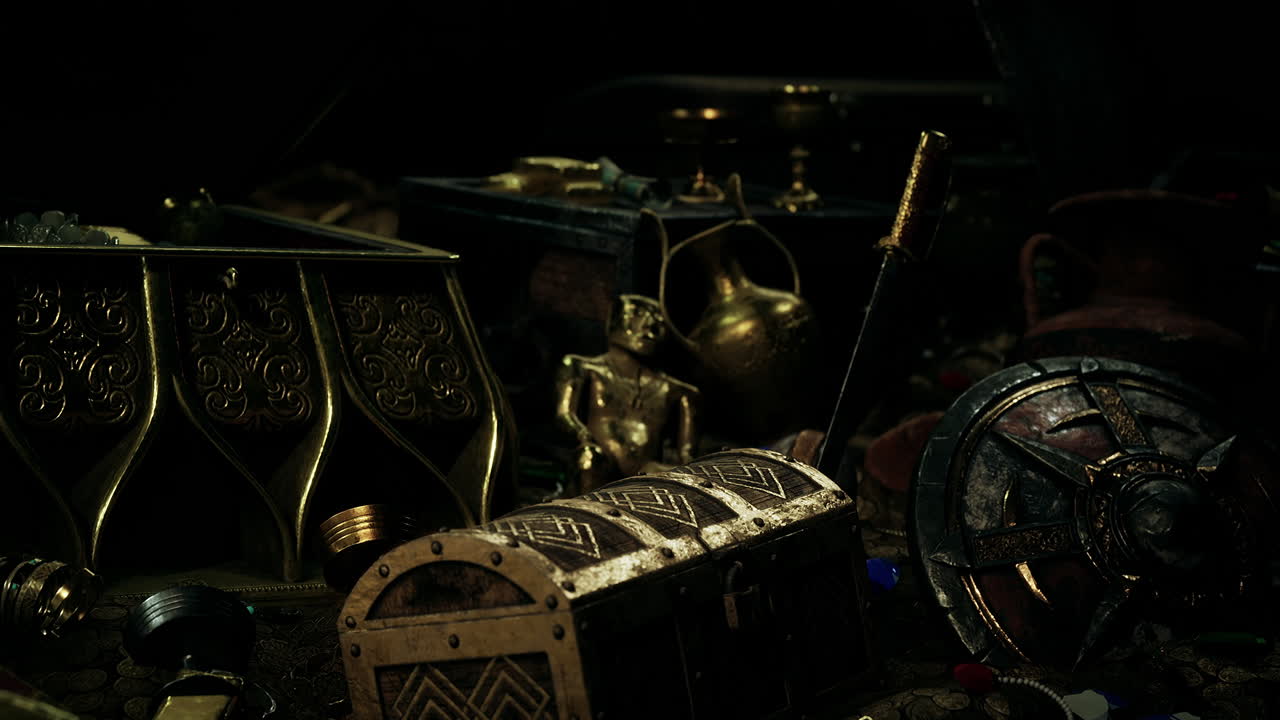 어 ⁇  속에서 보석과 금 동전을