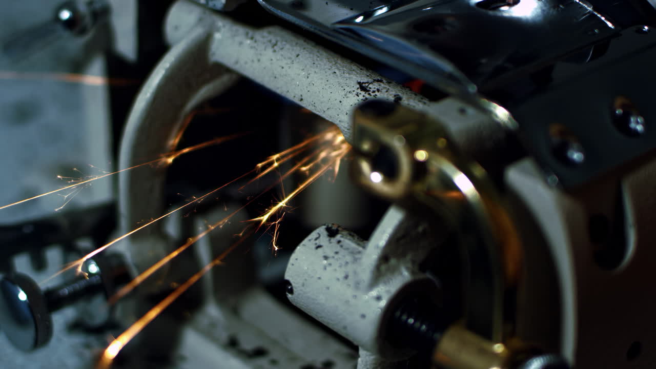 Skilled machinist operator on a large industry in metal factory workshop with Large lathe Machines