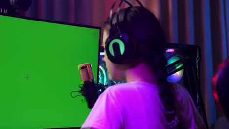 gamer streaming using green screen