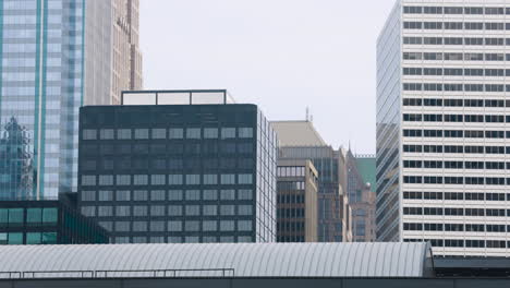 static shot of high rise buildings in downtown chicago