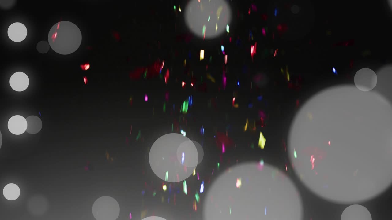On start confetti fragments cascading while translucent circles drifting to create festive mood
