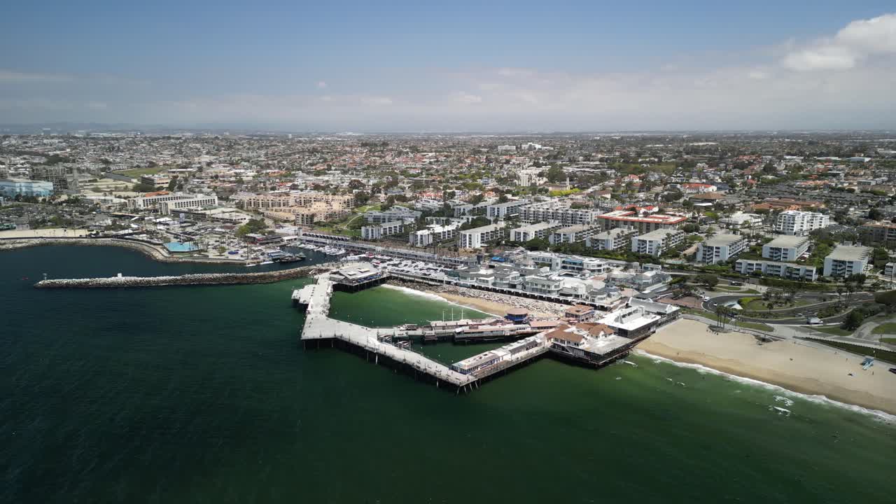 Aerial 4K drone footage of Redondo Beach Pier in Los Angeles, California, showcasing the Pacific Ocean, coastline, marina, and iconic waterfront landmark from scenic elevated views