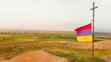 close aerial view armenian flag in windy day outdoors with countryside and ararat mountain background