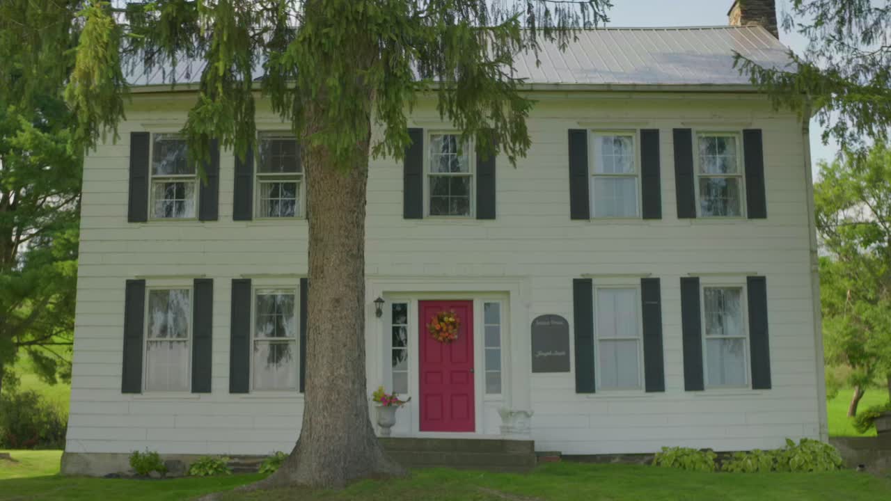 Static shot of the front Original Historic House of Josiah Stowell friend of Joseph Smith hired him for money or Treasure digging in the early 1820s where he stayed went to school Mormon Origins