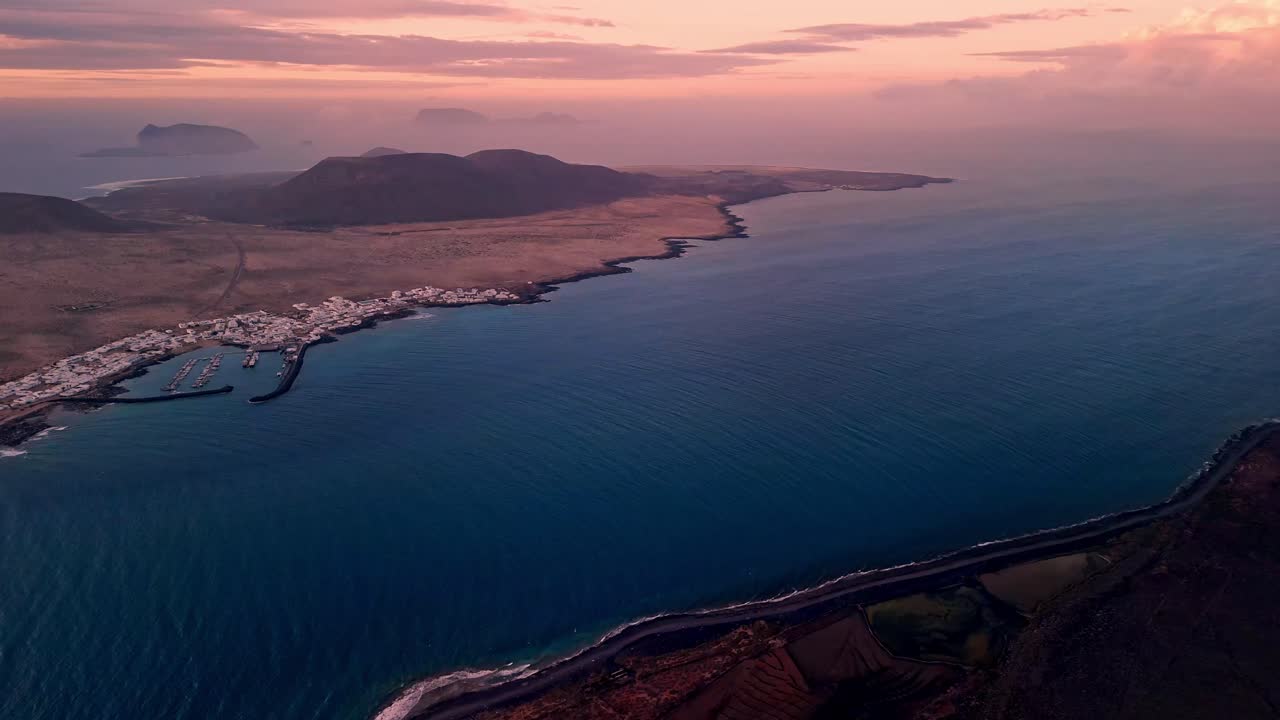 Breathtaking aerial drone footage captured at sunset from El Mirador del Río in Lanzarote, Canary Islands.
