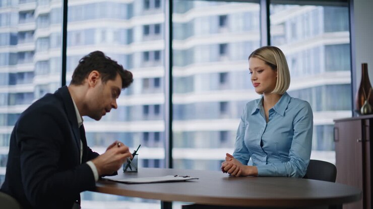 Business meeting and handshake in a modern office
