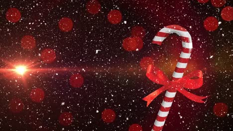 Animation-of-christmas-candy-cane-over-spots