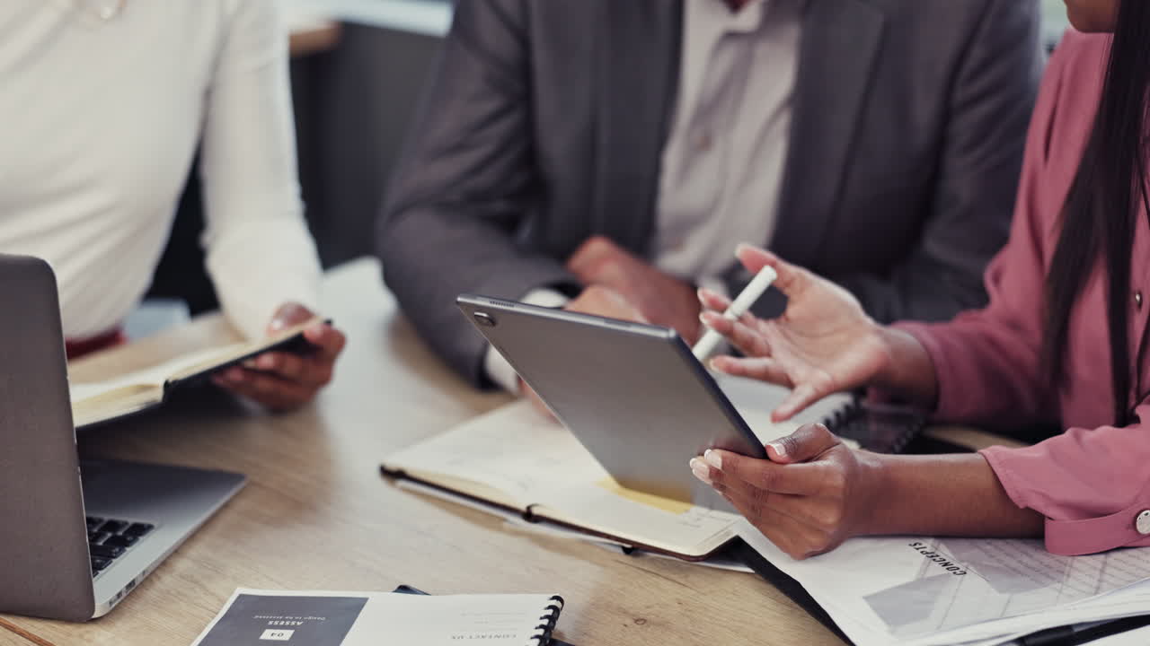 Hands, tablet and business people talking