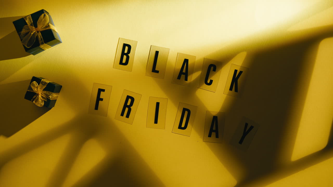 Black Friday Text On Yellow Background With Light Beam