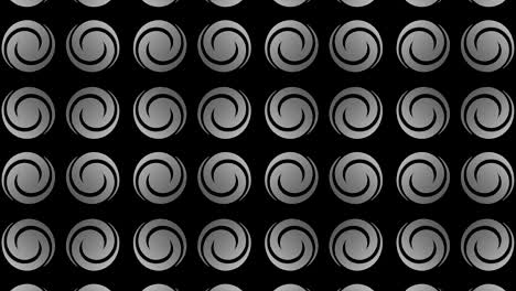 graphic pattern in black and white with stroboscopic and hypnotic effect, while increasing in size and then reducing it.