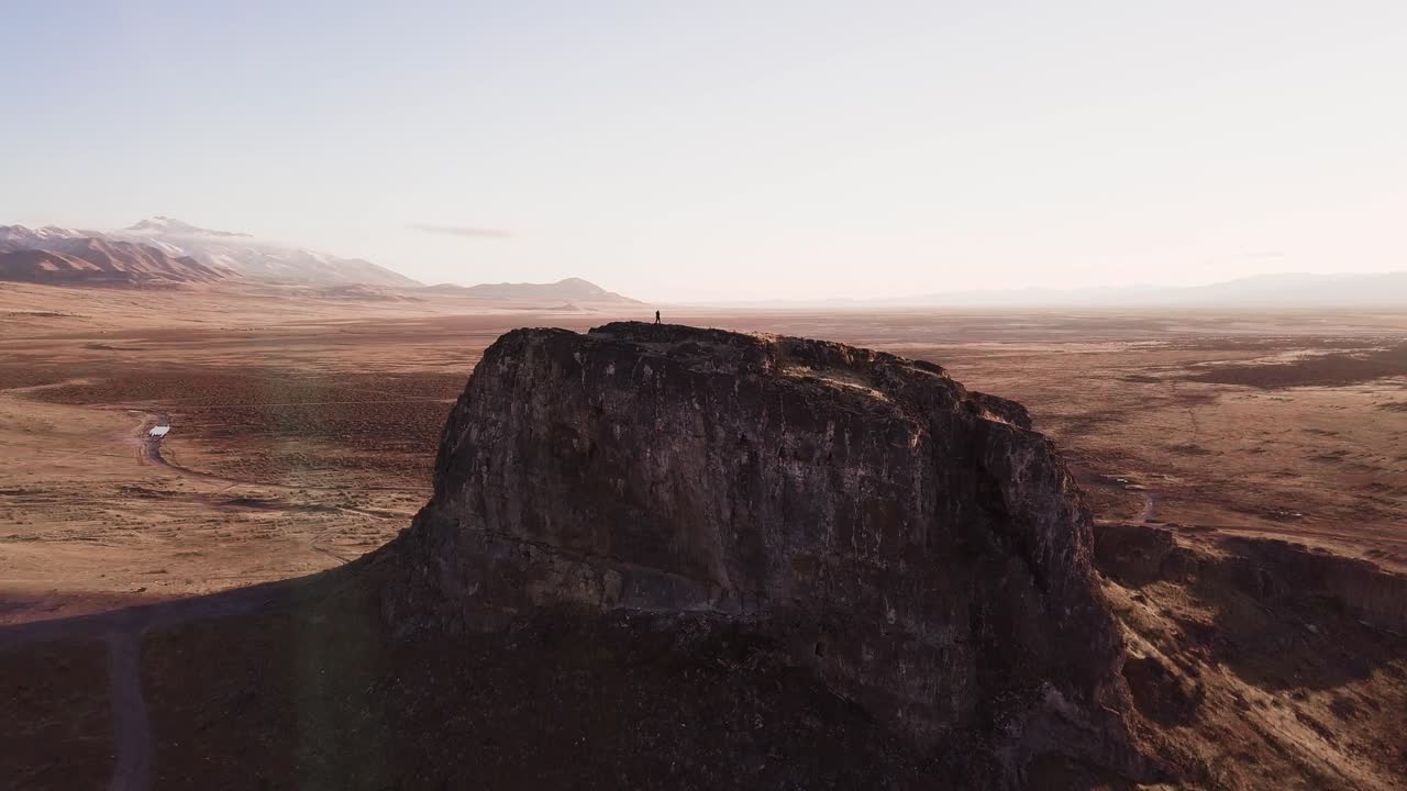4k Aerial drone footage. Lonely hiker in desolate landscape of Utah