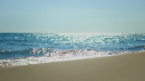 ocean waves on sandy beach