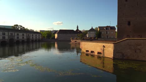 ponts couverts de strasbourg bridge in la petite france with historical landmark barrage vauban on sunny evening