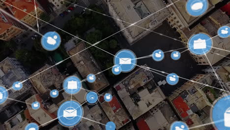 animation of network of connections with icons over cityscape