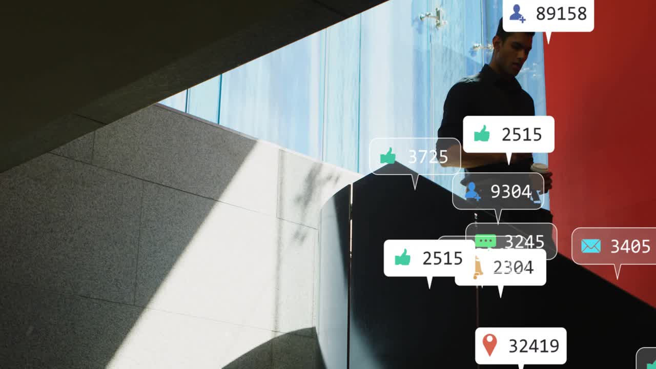 Man descending stairs, sipping coffee then tapping phone, checking updates causing social alerts