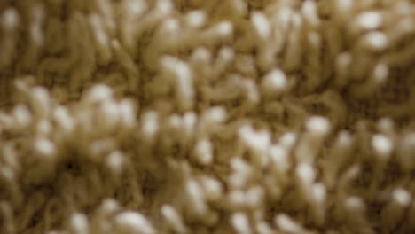 threads of beige color towel macro.