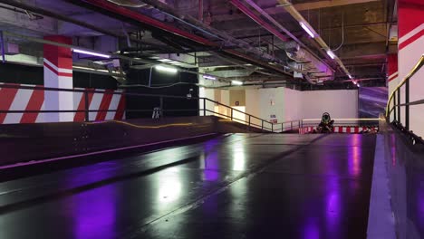 indoor go-kart track with racers