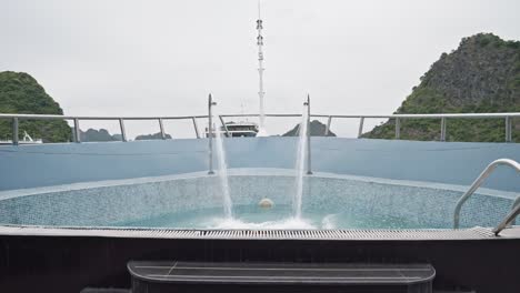 jacuzzi on deck of cruise ship in ha long bay, vietnam