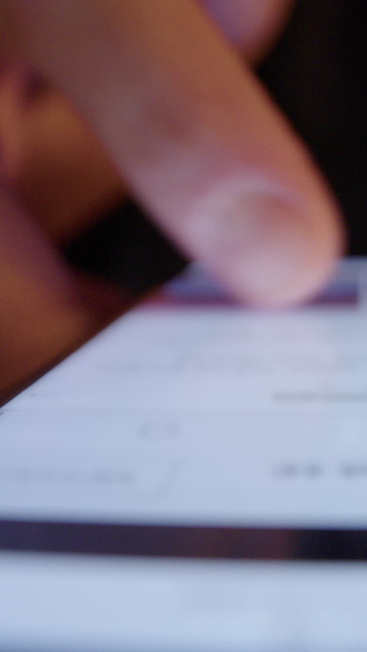 Mindlessly scrolling on smartphone social media app, digital addiction. Vertical